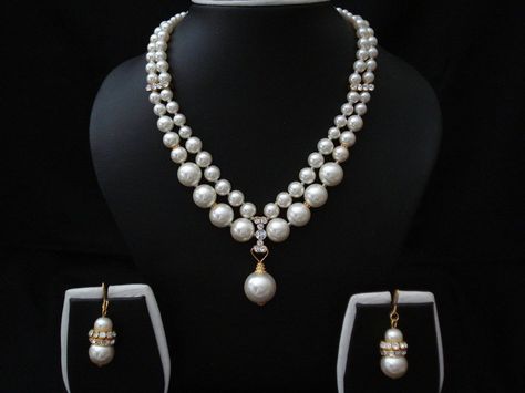 Do You Know Wearing Pearl Stone Improves ‪#‎Love‬ and Marital Realtions ‪#‎Pearl‬ ‪#‎Gemstone‬ is related with the planet moon which aid in improving the relation between married couples by diffusing love and affection in their ‪#‎relations‬. Moreover, this stone also help in establish strong relations among the family. https://youtu.be/r7owF-kcXPQ Elegant Pearl Jewelry, Fine Pearl Jewelry, White Pearl Jewelry, Elegant Wallet, Pearl Jewelry Design, Pearl Necklace Designs, Diy Jewelry Necklace, Bridal Diamond Jewellery, Pearl Jewelry Necklace