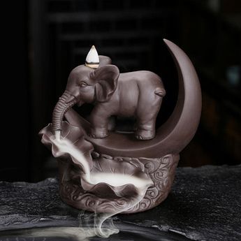 PRICES MAY VARY. 【Unique Lucky Elephant Moon Incense Burner】 Ignite the incense cone and place it on it. The rich aroma of smoke slowly flows from the elephant’s nose, and the incense burner is surrounded by smoke, full of mystery. 【Function】 Lit a incense cones can clean air, refreshing, maintaining a pleasant body and mind, improving efficiency and improve quality of life meditate and relax, relieve stress, improve immunity and improve sleep quality. 【Perfect Gift】YYW This Ceramic moon incense Home Office Brown, Ceramic Fountain, Incense Holder Ceramic, Waterfall Incense, Backflow Incense Burner, Incense Burner Holder, Sandalwood Incense, Backflow Incense, Lucky Elephant