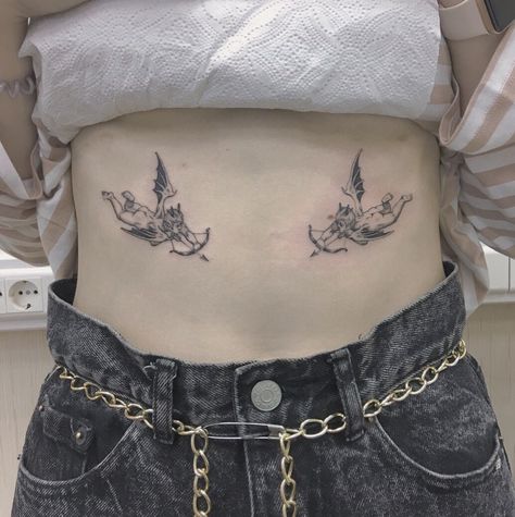 Symmetric Tattoos, Age Tattoo, Cupid Tattoo, Stomach Tattoos Women, Cherub Tattoo, Torso Tattoos, Hidden Tattoos, Devil Tattoo, Cool Chest Tattoos