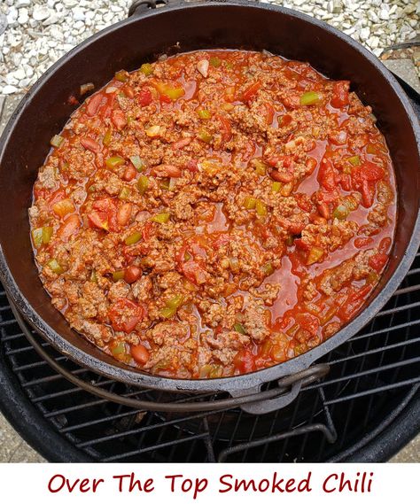 There are as many variations of Over The Top smoked chili as there are variations of ‘regular’ chili. Often referred to as OTT chili, the basic idea is that you smoke a ground beef mixture over a pot of chili mixings, such as tomatoes, beans (oh no! I used beans!), etc. As the beef cooks some of the fat drips into the chili pot, adding flavor. And of course the smoked beef picks up on some smoke flavor, too. Over The Top Chili Smoker, Ott Chilli, Over The Top Chili Pit Boss, Over The Top Smoked Chilli, Smoked Over The Top Chili, Over The Top Chili Traeger, Over The Top Smoked Chili, Over The Top Chili Pellet Grill, Smoked Chilli Recipe