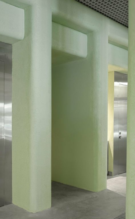 light green textured stucco walls envelop malbon miami golf boutique by 22RE Green Stucco, Off White Store, Light Green Walls, Stainless Steel Bench, California Architecture, Stainless Steel Railing, Container Architecture, Stucco Walls, Brick Architecture