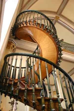 Loretto Chapel, Santa Fe, NM. In 1878 the nuns needed steps to the choir loft. They prayed to St. Joseph, the patron saint of carpenters.  Within days, a mysterious man showed up with a donkey and a few tools, looking for work.  They put him to work on the staircase, however, he wanted total privacy and disappeared when anyone entered the chapel.  Using a saw, a square, the carpenter built this incredible spiral staircase.  When the job was complete, and the nuns tried to pay him, he was gone. Loretto Chapel, Mysterious Man, Looking For Work, A Donkey, The Staircase, Spiral Stairs, Land Of Enchantment, Stair Steps, Santa Fe Nm