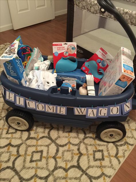 Wagon Ideas, Unique Baby Boy Gifts, Welcome Wagon, Newborn Baby Boy Gifts, Baby Essentials Newborn, Baby Shower Baskets, Cheap Baby Shower, Baby Play Activities, Baby Shower Favors Girl