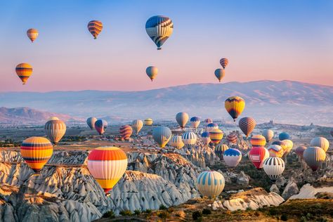 Discover rose-tinted valleys, towering ‘fairy chimneys’ and entire underground cities on a visit to this spectacular area of central Turkey, writes Jennifer Hattam Danxia Landform, Turkey Travel Guide, Air Balloon Festival, Landform, Hot Air Balloon Festival, Socotra, Balloon Flights, Cappadocia Turkey, Star Tours