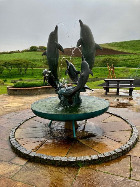 Hi all 👋 Feel free to join in whenever you have a water picture to post (any type of water, in any state, will do). See below for how to join the fun 😁 This dolphin fountain can be found outside the reception building at Elie Caravan Park. How To Join In Hae a guid … Continue reading Dolphin Fountain — Water Water Everywhere #192 Dolphin Fountain, Water Pictures, Caravan Park, Water Water, Photo Blog, Blog Photo, Caravan, Dolphins, The Outsiders