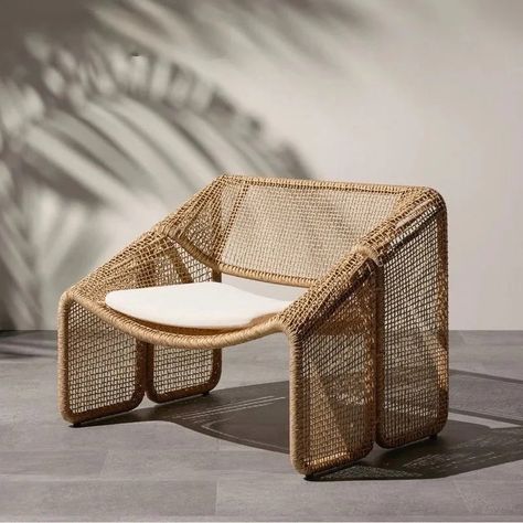 Introducing the Hillia Chair - a masterpiece of luxury and comfort. Crafted with water-resistant rattan, outdoor aluminum, and sumptuous polyester fabric, this chair is equally at home indoors or outdoors. With its generous dimensions of 70cm H x 70cm D x 90cm W, it offers the perfect blend of style and relaxation. Ele Wicker Lounge Chair, Rattan Lounge Chair, Seat Cushion Covers, Outdoor Chair, Rattan Chair, Outdoor Wicker, Rattan Furniture, Four Hands, Landscape Ideas