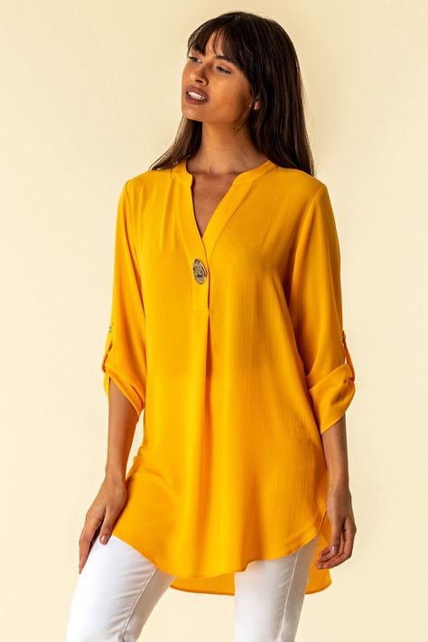 A sure fire way to inject some colour into your looks, this longline tunic top is sure to turn heads. #romanoriginals #roman #springfashion #2021 #springlooks #springtops #everydaytops #longlinetops #tunic #buttontop #amber Tunic Tops With Jeans, White Linen Trousers, Cotton Tunic Tops, Linen Top Women, Casual Indian Fashion, Blouse Pattern Sewing, Pattern Sewing, Lovely Tops, Yellow Blouse