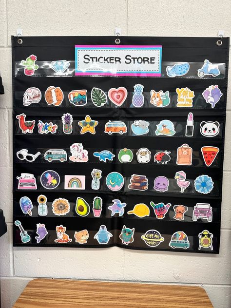 Pocket chart with prize stickers. Incentives For Elementary Students, Sticker Store Classroom Middle School, Sticker Shop Classroom, 3rd Grade Incentives, Sticker Rewards Classroom, Elementary Prize Box Ideas, Class Sticker Store, Classroom Incentives Kindergarten, Sticker Reward System