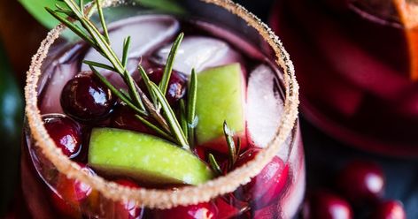 10 Festive Holiday Drinks | The Modern Proper Margarita Mix Drinks, Christmas Sangria Recipes, Cranberry Mocktail, Cranberry Sangria, Holiday Mocktail, New Year's Drinks, Festive Holiday Drinks, Easy Mixed Drinks, Holiday Sangria