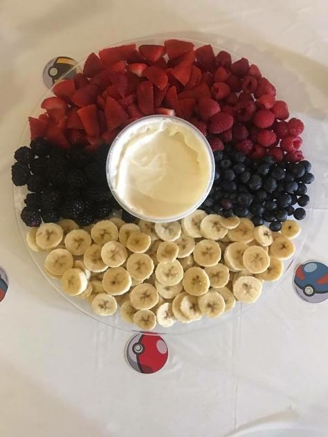 Pokémon birthday party Pokeball fruit tray Gender Reveal Ideas Pokemon, Pokemon Fruit Tray, Pokemon Gender Reveal Ideas, Pokemon Gender Reveal, Pokemon Baby Shower Ideas, Nerdy Gender Reveal, Pokémon Birthday Party, Pokemon Party Decorations, Pokemon Birthday Cake