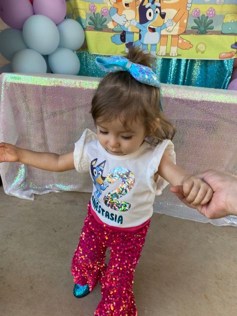 I made her shirt with my cricut machine and ordered her fabulous hot pink bell bottoms with glitter boots. She was super cute! 😍🥰 #bluey #blueybirthdayparty #birthdaygirl #outfitoftheday Bluey Birthday Outfit For Girl, Hot Pink Bell Bottoms, Pink Bell Bottoms, Dream Birthday, Bluey Birthday, Glitter Boots, Birthday Girl Outfit, Cricut Machine, 1st Bday