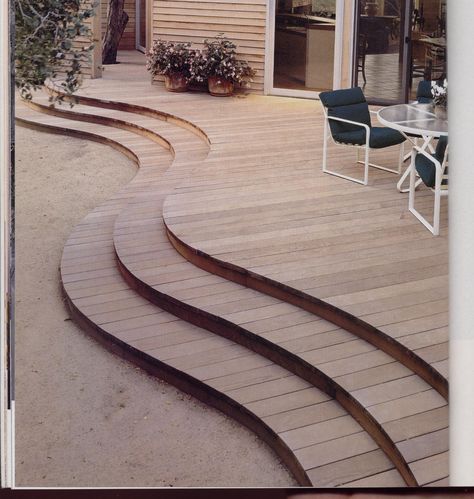 Wooden decks can be an immediate extension of a house or a remote space overlooking a particularly spectacular vista and be designed in many shapes and sizes.  This one bows where it needs to, where a table and chairs need more room than circulation. Curved Patios, Decking Path, Curved Decks, Round Terrace, Curved Decking, Curved Deck, Curved Patio, Floating Deck, Deck Designs Backyard