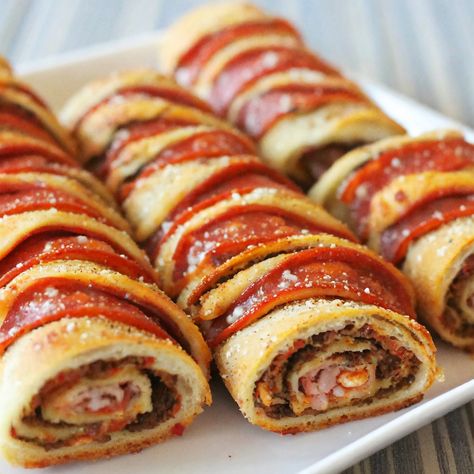 🍕 Homemade Pepperoni Pizza Rolls! 🎉... - Planet Of Recipes Homemade Pepperoni, Pepperoni Pizza Rolls, Homemade Pepperoni Pizza, Pizza Roll Recipe, Refrigerated Pizza Dough, Pepperoni Rolls, Fun Dinner, Gooey Cheese, Pizza Rolls