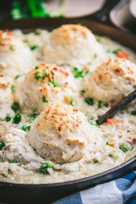 Country Chicken and Biscuits is a classic down-home comfort food dinner! The creamy chicken and vegetables are topped with fluffy, cheesy drop biscuits for a hearty and delicious family-friendly meal. Bake it in a casserole dish or in a cast iron skillet and supper is served! Chicken Casserole Dinners, Biscuits Casserole, Dinner Casserole Recipes, The Seasoned Mom, Country Chicken, Chicken And Biscuits, Drop Biscuits, Comfort Food Recipes Dinners, Food Dinner