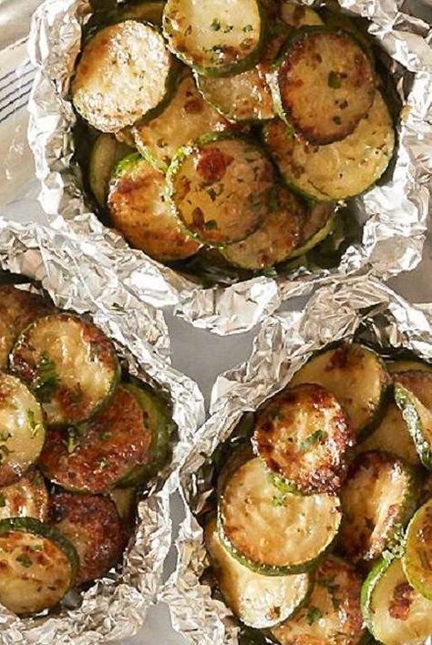 Zucchini slices with cheesy herb butter are wrapped in foil packets and grilled until tender. Perfect for an easy campfire dinner side! Grill Packets, Campfire Dinners, Foil Packet Meals, Dinner Side, Grilled Potatoes, Berry Dessert, Foil Packets, Summer Recipe, Dinner Sides