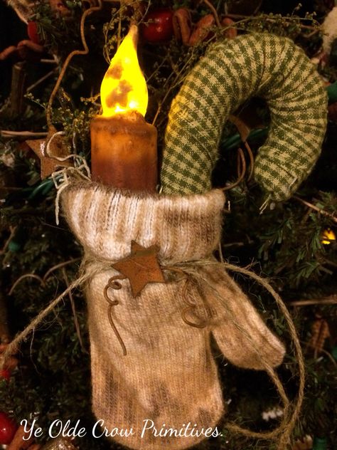 Little primitive mitten with LED candle stick candy cane and rusty tin that I've made for a tree or wreath by ye Olde crow primitives Primitive Mittens, Mitten Craft, Led Lightbulbs, Primitive Christmas Crafts, Stick Candy, Primitive Christmas Decorating, Prim Crafts, Primitive Candles, Rusty Tin