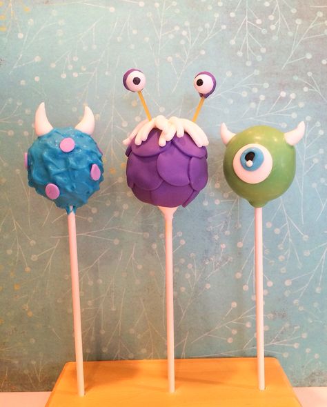 Monsters Inc cake pops. Sully, Boo and Mike Wazowski Mike Wazowski Cake Pops, Monster Inc Desserts, Monster Inc Cake Pops, Monster Inc Treats, Monsters Inc Cake Pops, Sully Cake, Buu Monster Inc, Monsters Inc Cake, Sully And Boo