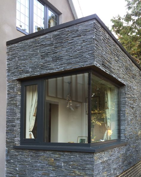 Nutshell Cottage remodelling by Roger Meyer Architecture - Corner glazed window with black slate cladding Corner Window Ideas Exterior, Corner Window Exterior, Corner Balcony, Slate Cladding Exterior, House Exterior Ireland, Stone Cladding Exterior, Slate Cladding, Narrow House Designs, Window Seat Design