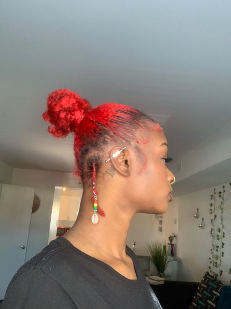 Natural bun with rat tail loc , industrial bar , and musical heart tattoo behind the ear Rat Tail Loc, Wisdom Loc Natural Hair, Wisdom Loc, Rat Tail Hairstyle, Rat Tail Hair, Rat Tails, Tattoo Behind The Ear, Edgy Hairstyles, Tail Braids