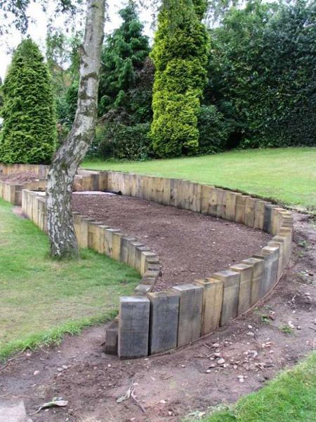 Railway Sleepers Sleepers Garden, Sleeper Wall, Sleepers In Garden, Sloped Backyard Landscaping, Garden Retaining Wall, Garden Walls, Railway Sleepers, Sloped Backyard, Landscaping Retaining Walls