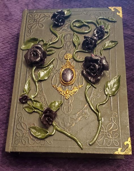 Our witch boxes are packed with one of a kind mystical items! They are not only stunning but also full of everything you need to start your journey into witchcraft! Choose from our  Herbal Witch set, this beautiful book box is 9"×12" it is adorned with beautiful black polymer clay rose vines and an amethyst pendent on the front. Inside you will find  6 beautifully adorned herb bottles  containing: Lavender  Hibiscus  Dragon Blood  Black Salt Mugwart  Frankincense tears  A beautiful handcrafted s Herb Bottles, Mystical Items, Mirror Scrying, Witch Boxes, Herbal Witch, Polymer Clay Rose, Black Polymer Clay, Clay Rose, Witchy Gifts