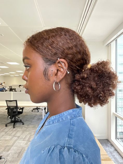 Surface piercing, industrial piercing, curly hairstyles, curly buns, piercing ideas, piercing inspo, melanin, dark skin curly hair, black girl hairstyles, black barbie Piercings On Women, Industrial Piercing Black Women, Cute Piercings Ears, Ginger Hair On Dark Skin, Ears Piercing Ideas, Dark Skin Curly Hair, Industrial Piercing Aesthetic, Piercing Black Women, Copper Ginger Hair