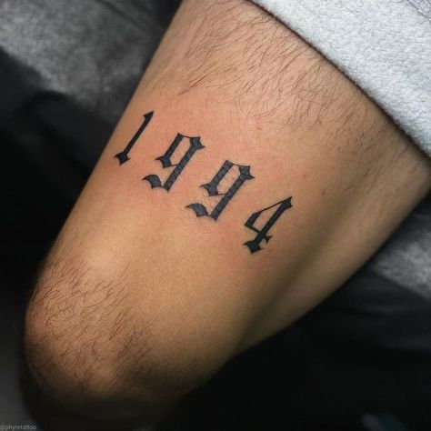 Roman Numeral Knee Tattoo, Date Above Knee Tattoo, Birth Year Leg Tattoo, Year Above Knee Tattoo, Roman Numeral Tattoo Men Thigh, Tattoo Ideas For Men Knee, Birth Year Tattoo Men, Above Knee Tattoo Men, Over Knee Tattoo Men