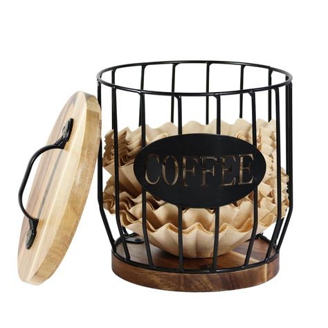 PRICES MAY VARY. ☕ Stylish Coffee Filter Holder - Made with metal and acacia wood, our attractive coffee filter holder easily fits most round basket-style coffee filters. It keeps them organized and accessible, adding a touch of farmhouse charm to your coffee bar decor. 😊 Large Capacity Coffee Filters - 6.3" diameter x 6.6" height, holds over 500 coffee filters, 30k cups, 40 coffee pods or 80 original capsules.Rustic farmhouse style meets functionality in this versatile storage container. ✨Mult Farmhouse Kitchen Decor Countertop, Coffee Station Ideas Countertop, Hutch Coffee Bar, Coffee Filters Storage, Coffee Basket, Coffee Filter Holder, Coffee Mug Display, Coffee Bar Station, Coffee Pod Storage