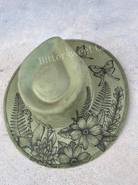 This Fedoras item by BittersweetCanvas has 195 favorites from Etsy shoppers. Ships from Phoenix, AZ. Listed on Jun 26, 2024 Wide Brim Fedora Women, Explorer Hat, Wood Burn Designs, Sage Green Floral, Country Jewelry, Hat Wedding, Painted Hats, Felt Cowboy Hats, Western Hat