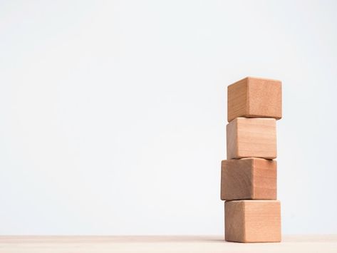 Four empty wooden cube blocks stack on t... | Premium Photo #Freepik #photo #block #wooden-blocks #cubic #cube-box Space Banner, Wooden Cubes, Composition Design, Light Blue Background, Brick Building, Building Construction, Negative Space, Wooden Blocks, Disco Ball