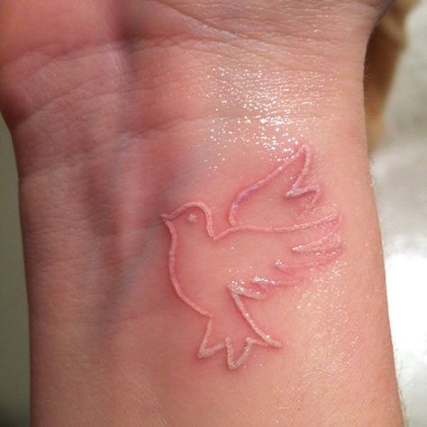 White ink dove tattoo - 55 Peaceful Dove Tattoos | Art and Design Peace Dove Tattoos, White Dove Tattoos, Colorful Bird Tattoos, Dove Tattoo Design, Dove Tattoos, Cross Tattoos For Women, Key Tattoos, Dove Tattoo, Kunst Tattoos