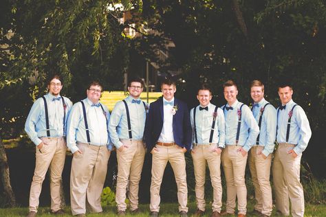 Light blue shirt. Khaki pants. Navy suspenders. Groom with blazer. Groomsmen pose. Groomsmen Attire Light Blue, Blue Shirt Khaki Pants, Khaki Groomsmen, Blue Groomsmen Attire, Khaki Pants Outfit Men, Navy Blue Pants Outfit, Khaki Wedding, Casual Groomsmen, Blue Groomsmen