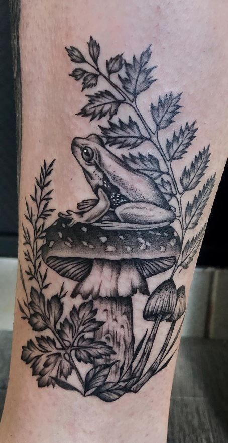 Frog Nature Tattoo, Frog King Tattoo, Animal And Insect Tattoos, Frog Tattoo With Flowers, Colored Mushroom Tattoo, Dark Garden Tattoo, Black And Grey Frog Tattoo, Frog With Mushroom Tattoo, Mother Nature Sleeve Tattoo