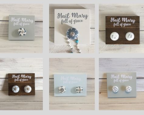 "The rosary hanger is made of reclaimed pine. Customize with your choice of knob color/number (1 or 2 knobs) and wood finish. The text is made of high quality vinyl. Each hanger is made to order based on your customization. This is the perfect way to get your rosaries out in the open where they can be admired!  Product size (1 knob): approximately 5\" x 5\" x 3/4\".  Product size (2 knobs): approximately 5\"x 7\" x 3/4\" As with all of our products, no two pieces of wood are the same - products Rosary Display, Rosary Hanger, Custom Rosary, Mother Mary Images, Wall Holder, Hanger Diy, Catholic Family, Faith Formation, The Rosary