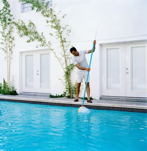 Man cleaning out swimming pool Pool Business, Pool Cleaning Tips, Safe Pool, Swimming Pool Cleaning, Pool Stuff, Fiberglass Swimming Pools, Robotic Pool Cleaner, Pool Care, Swim Season