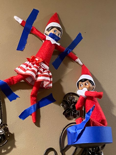 Naughty Elf captured his friend using painters tape Elf On The Shelf Duct Tape Ideas, Elf On The Shelf Taped Up, Funny Elfs, Elf On Shelf Printables, Elf Ideas Easy, Awesome Elf On The Shelf Ideas, Elf Activities, Elf Ideas, Do It Yourself Crafts