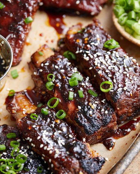 Sticky Asian Pork Ribs in the Oven - Bites with Bri Asian Pork Ribs In The Oven, Korean Sticky Ribs, Chinese Sticky Ribs Recipe, Asian Sticky Ribs, Sticky Asian Pork, Korean Pork Ribs, Asian Pork Ribs, Sticky Asian Ribs, Asian Ribs Recipe