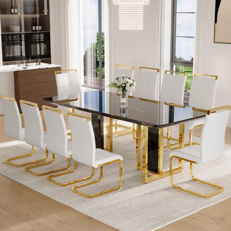 PRICES MAY VARY. 🎉Modern Black Dining Table Set : The center of dining room from luxury black golen faux marble dining table with 10 white chairs.The large rectangle spacious dimensions 79"L*30"H*39"D,offer ample room for dining essentials, centerpieces, and decorative accents, ensuring a comfortable and inviting dining experience for you and your guests. 🎉High Gloss Black Table Top: The table top is crafted from high-quality faux marble, meticulously designed to replicate the luxurious look a Black Rectangular Dining Table, Marble Dining Table Set, Glass Dining Set, Leather Dining Room Chairs, Grande Table, Dining Sets Modern, Kitchens And Bedrooms, Stylish Chairs, Marble Dining