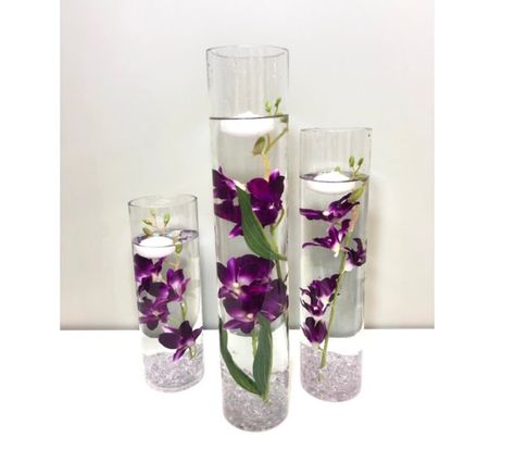 Submersible Purple Star Flowers/Floral Wedding Centerpiece with Floating Candles and Acrylic Crystals Kit by Featherology2 on Etsy Submersible Flowers, Cylinder Vase Centerpieces, Centerpiece With Floating Candles, Water Centerpieces, Green Wedding Centerpieces, Purple Wedding Centerpieces, Purple And Silver Wedding, Purple And Green Wedding, Purple Centerpieces