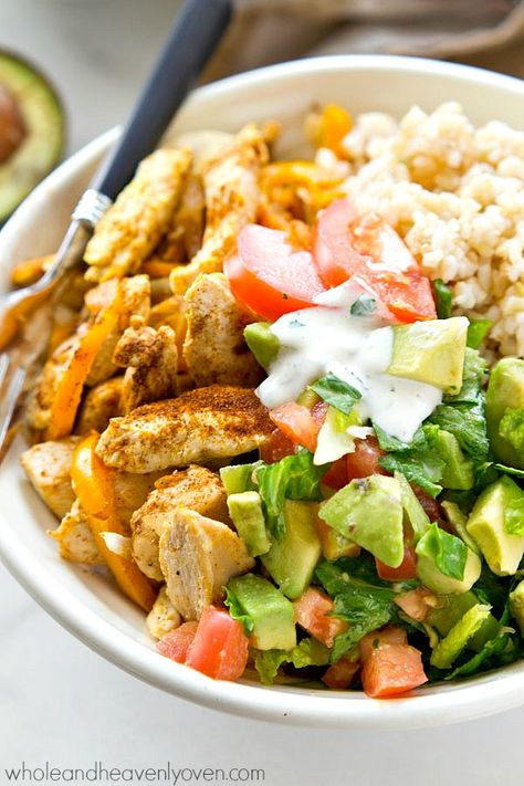 Zippy cajun-rubbed chicken, hot rice, and an amazing fresh avocado salad come together in these beautiful AND easy-to-throw together healthy rice bowls! Healthy Rice Bowls, Cajun Chicken Rice, Cajun Chicken And Rice, Rice Bowls Healthy, Chicken Rice Bowl, Avocado Recipes Healthy, A Balanced Meal, Healthy Rice, Chicken Rice Bowls