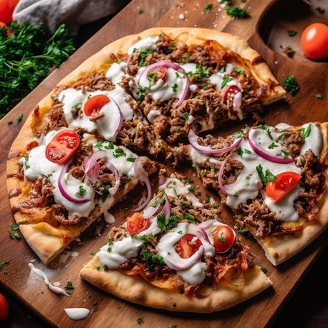 This vegan flatbread pizza with Mediterranean flavors is an easy yet tasty treat. The vegan lamb topping makes it unique and flavorful for both vegans and meat-lovers alike. #VeganFlatbreadPizza #MediterraneanCuisine #VeganLamb #KalamataOlives #FreshMint #CherryTomatoes #HummusDip #PlantBased #Recipe #Foodie #Pizza #Vegan Lamb Flatbread, Lamb Pizza, Vegan Flatbread Pizza, Mediterranean Flatbread, Vegan Flatbread, Flatbread Pizza Recipes, Meat Pizza, Vegetarian Life, Lamb Roast