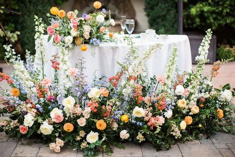 Colorful Sweetheart Table Flowers, Summer Color Wedding Theme, Spring Garden Wedding Flowers, Where To Put Flowers At Wedding, 2023 Wedding Florals, Wedding Flowers Multicolor, Bright Spring Wedding Florals, Head Table Florals Wedding, Colorful Wedding Aisle Flowers