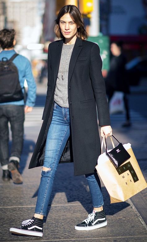 Alexa Chung wears a gray sweater, long black coat, skinny jeans, and high-top Vans sneakers Comfortable Holiday Outfits, Vans Sk8 Hi Black, Celebrity Sneakers, How To Wear Vans, Alexa Chung Style, High Tops Sneakers, Vans Outfit, Long Black Coat, Sneakers Looks