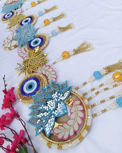 Evil eye Bandhanwar with mirror lotus 🪷🪷 beauty 😍 DM us for more details or Whatsapp us on 9867422790 Latest Bandarwal Designs, Bandarwal Designs, Arti Decoration, Toran Designs, Thali Decoration, Thali Decoration Ideas, Tissue Paper Flowers Diy, Heart Clip Art, Diwali Decoration Items