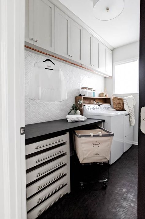 Can you believe that this laundry room was just a builder-grade space with a single wire shelf? Now this laundry room is full of function and storage. Complete with lay flat drying drawers, tall cabinets, a folding table, and a fold-down drying rack...and the best part? It's all DIYed. See how you can add storage and function to your laundry room on a budget. Drying Drawers, Laundry Folding Station, Laundry Folding Tables, Laundry Table, Laundry Room/mudroom, Tall Cabinets, Laundry Mudroom, Mud Rooms, Room Hacks