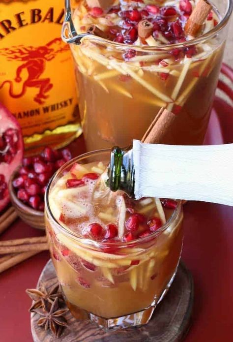 Top this Sparkling Fireball Apple Sangria with prosecco, sparkling cider or plain seltzer! #sangriarecipe #cocktailrecipe #cidercocktails #fireballwhiskey Christmas Sangria Recipes, Fireball Drinks, Apple Cider Sangria Recipe, Sparkling Apple Cider, Christmas Drinks Alcohol Recipes, Christmas Sangria, Apple Sangria, Cider Sangria, Apple Cider Cocktail