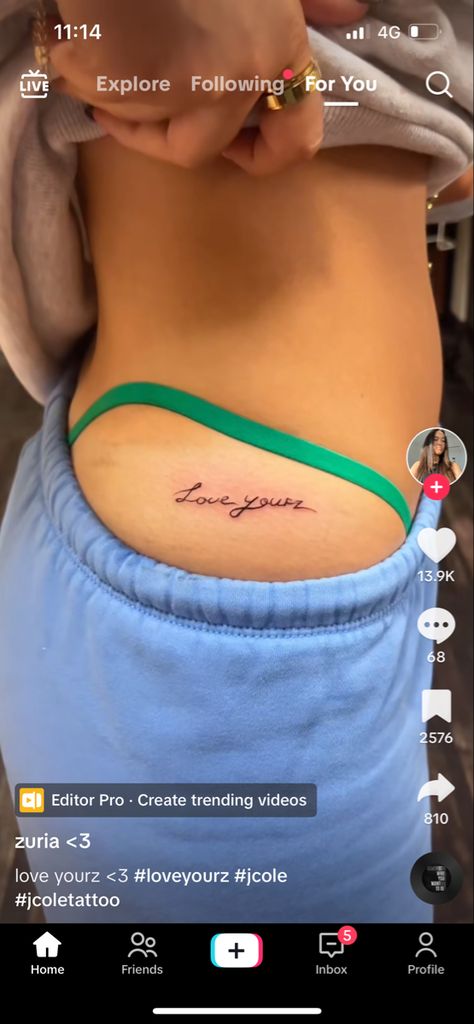 Love Yourz J Cole Tattoo Hip, Love Yourz J Cole Tattoo With Butterfly, 4 Your Eyes Only J Cole Tattoo, Love Yourz J Cole Tattoo Cursive, Tattoos For Women Underboob, Underboob Tattoo Black Women, Underboob Tattoos Words, Love Yourz J Cole Tattoo, Drake Tattoos