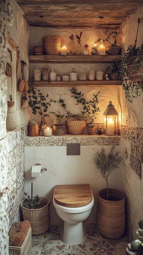 Wabi-sabi style bathroom with wooden toilet seat, potted plants, candles, and vintage tiles, creating a cozy, rustic Small Bathroom Ideas Cottagecore, Cozy Spa Bathroom, Japanese Spa Bathroom, Small Bathroom No Window Ideas, Basic Bathroom Remodel, Earthy Modern Bathroom, Earthy Tone Bathroom, Bathroom Without Tiles, Wabi Sabi Bathroom Inspiration