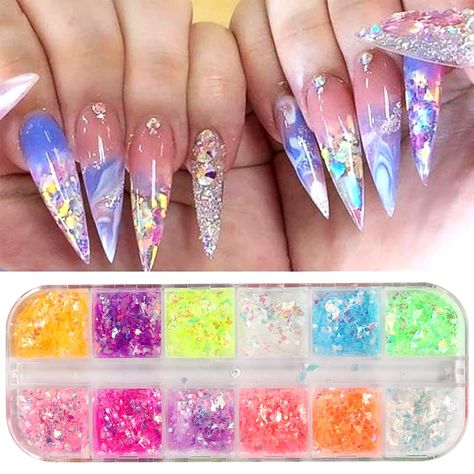 PRICES MAY VARY. 【NAIL GLITTER DECORATION SET】You will receive 12 colors chameleon nail art sequins, gradient laser glitter nail art design, convenient for your daily nail design. 【EASY TO USE】Suitable for professionals or beginners. Nails glitter sequins perfect for natural or artificial nails, and can be combined with all UV gel nail polish, DIP powder, and all nail powders. 【ENVIRONMENTAL MATERIAL】Holographic glitter sequins are made of environmental-friendly material, non-toxic and water res Fluorescent Nails, Mermaid Nail Art, Chameleon Nails, Manicure Nail Art, Uv Gel Nail Polish, Glitter Decor, Mermaid Nails, Glitter Flake, Nail Glitter