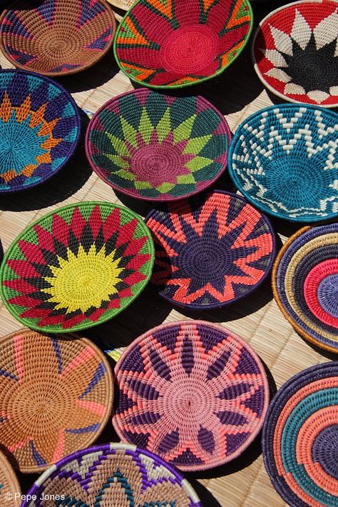 African baskets. Imagine a whole bunch of hand-made bowls from all over the world. Coiled Basketry, African Woven Basket, Colorful Baskets, Mexican Textiles, Basket Decor, Afrikaanse Kunst, African Home Decor, Weaving Designs, Beachy Boho